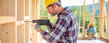 Man Working with Drilling Machine